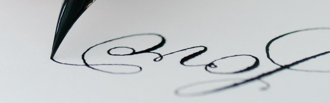 Photo of Writing in Calligraphy by Katya Wolf from Pexels